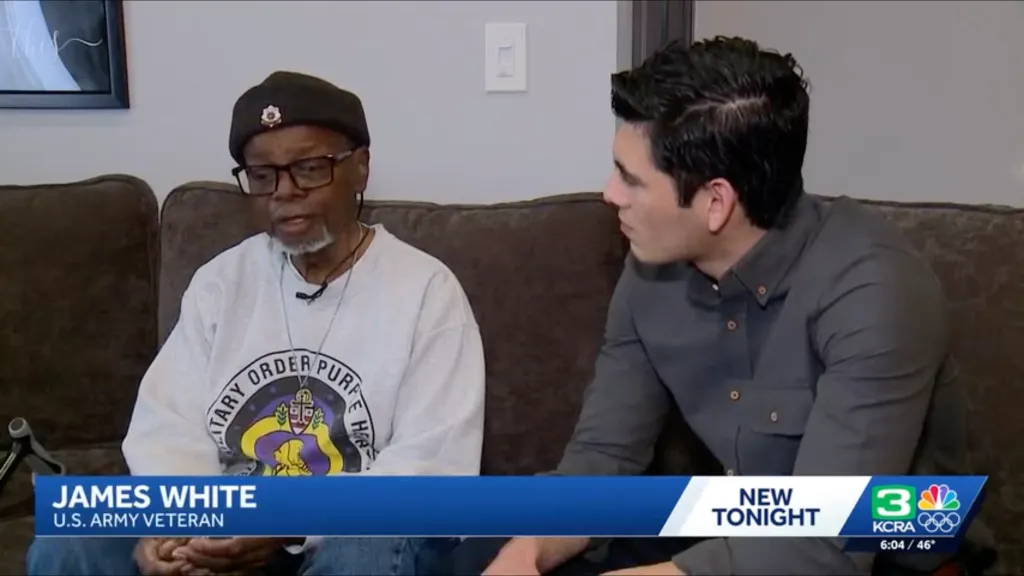 James White, a U.S. Army veteran, being interviewed on a couch.